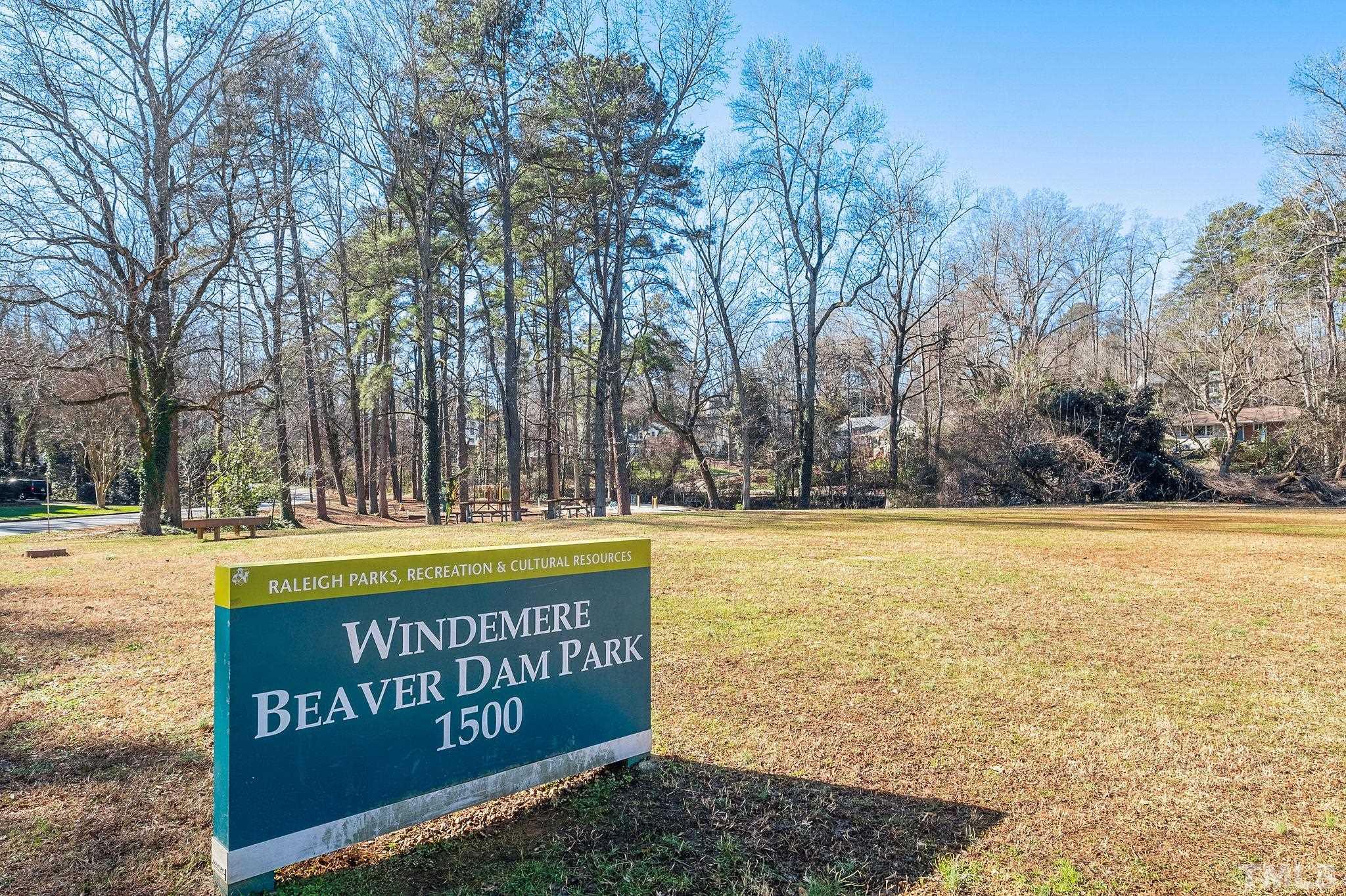 3025 Lewis Farm Road Raleigh, NC 27607 - Photo 41 of 42 a view of swimming pool with an outdoor space and seating area