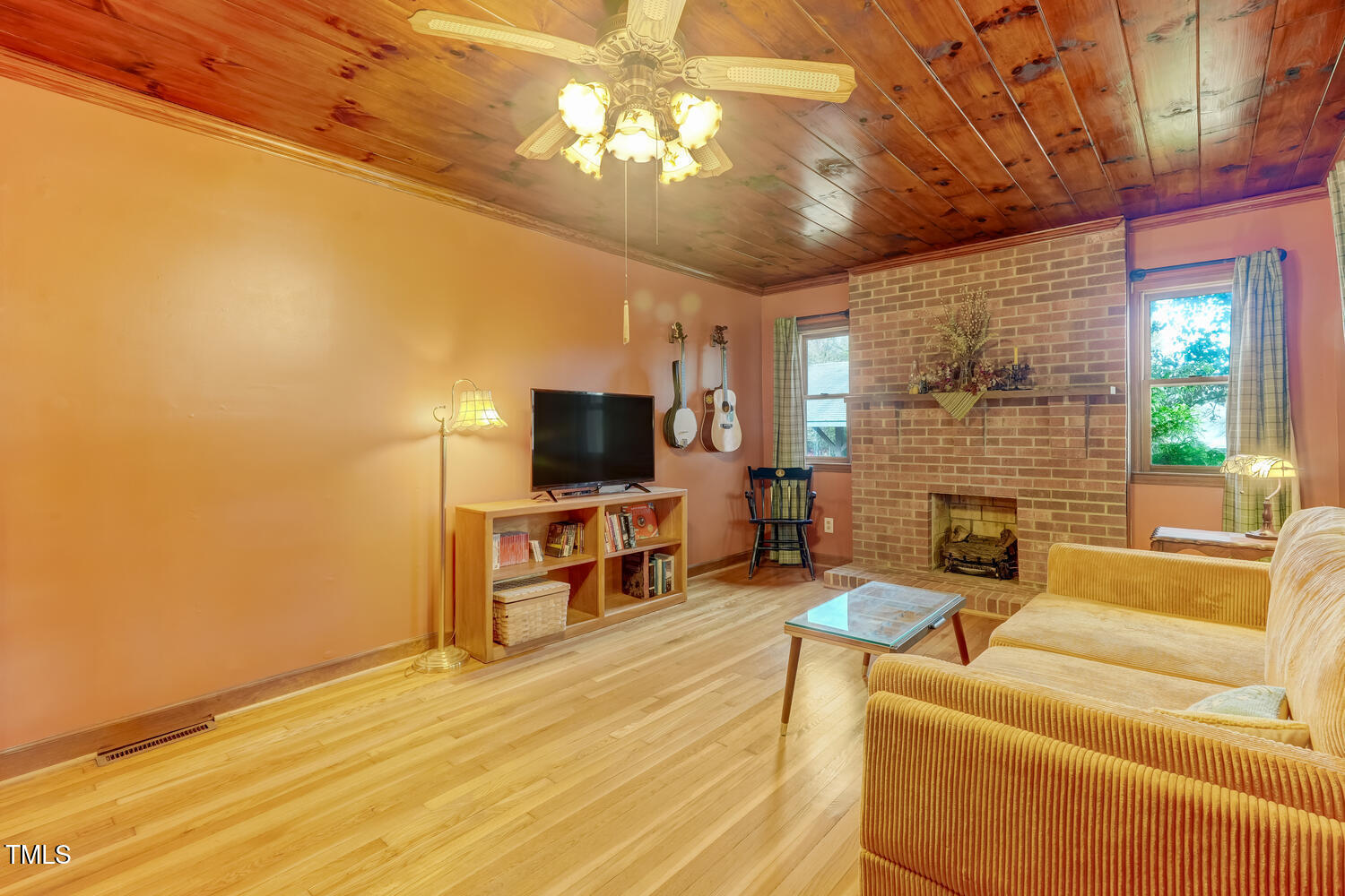 1365 Ashley Loop Reidsville, NC 27320 - Photo 12 of 55 a living room with furniture and a flat screen tv