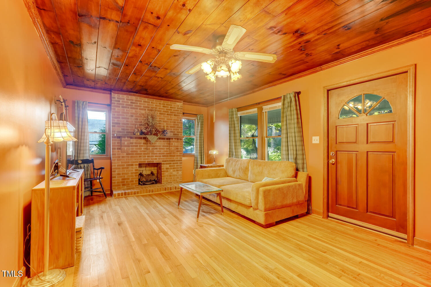 1365 Ashley Loop Reidsville, NC 27320 - Photo 13 of 55 a spacious bedroom with a large bed and a chandelier
