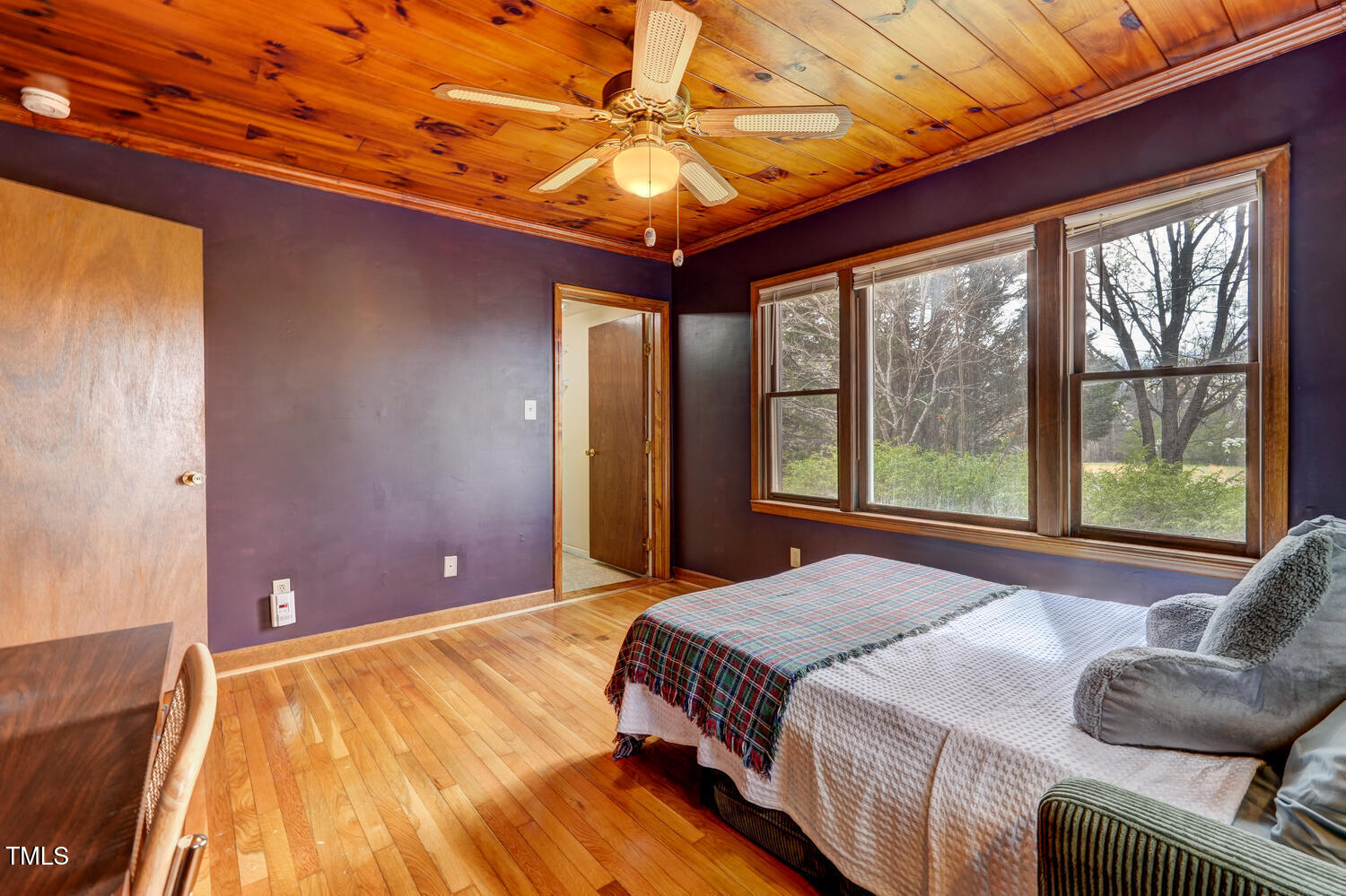 1365 Ashley Loop Reidsville, NC 27320 - Photo 22 of 55 a bed sitting in a bedroom next to a window