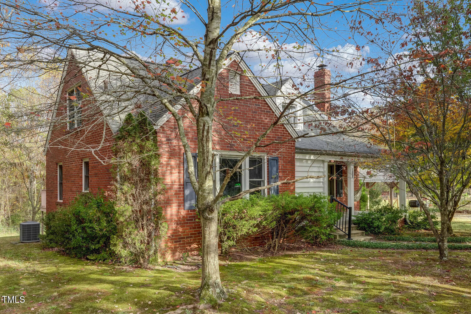1365 Ashley Loop Reidsville, NC 27320 - Photo 41 of 55 a house with a large tree in front of it