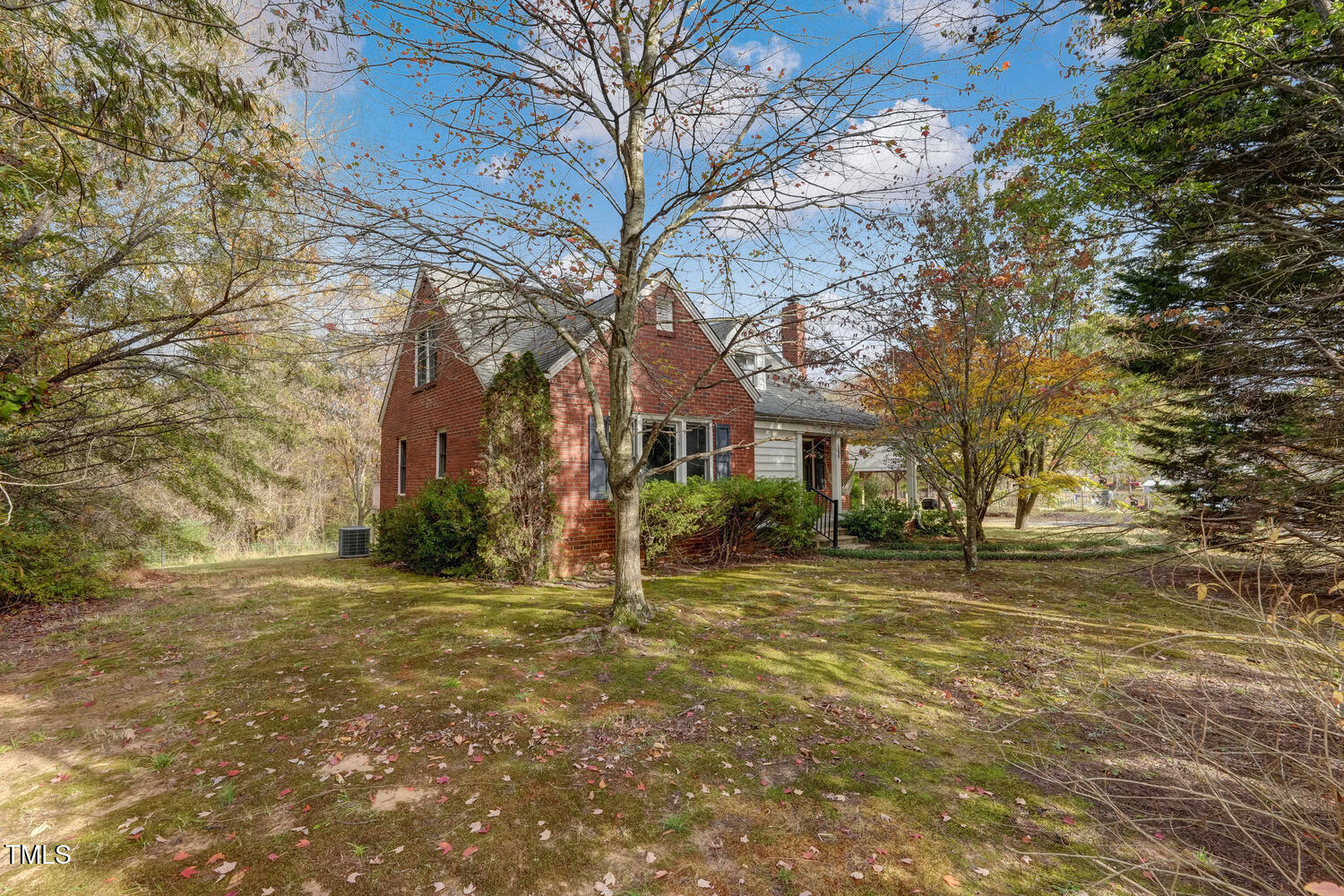 1365 Ashley Loop Reidsville, NC 27320 - Photo 9 of 55 a front view of a house with a yard