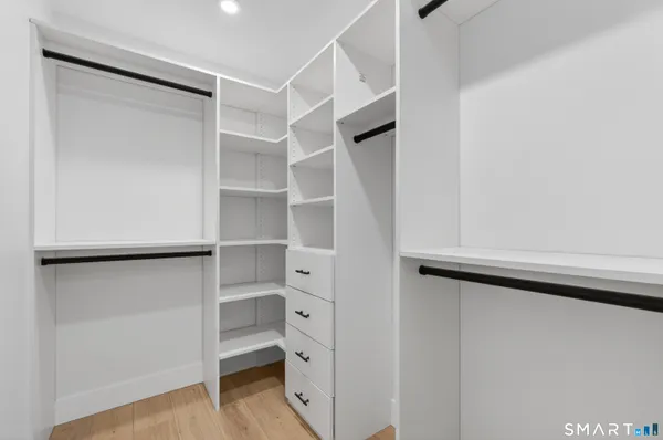 a view of an empty walk in closet