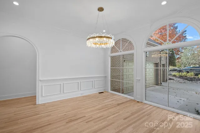 a bedroom with furniture and window