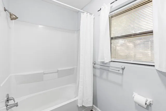 a bathroom with a bathtub