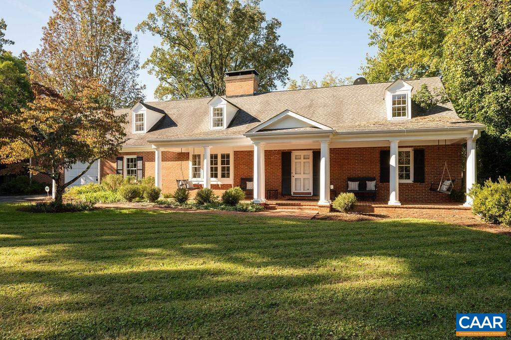 1882 Westview Road Charlottesville, VA 22903 - Photo 1 of 52 a front view of a house with a garden and trees