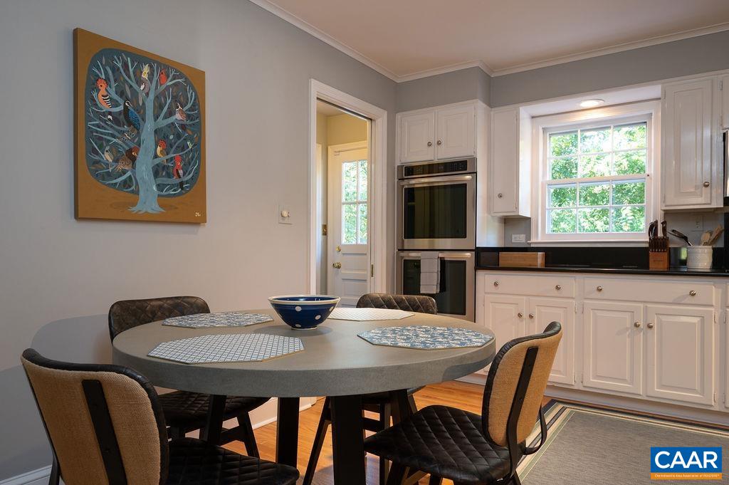 1882 Westview Road Charlottesville, VA 22903 - Photo 14 of 52 a view of a dining room with furniture window and outside view