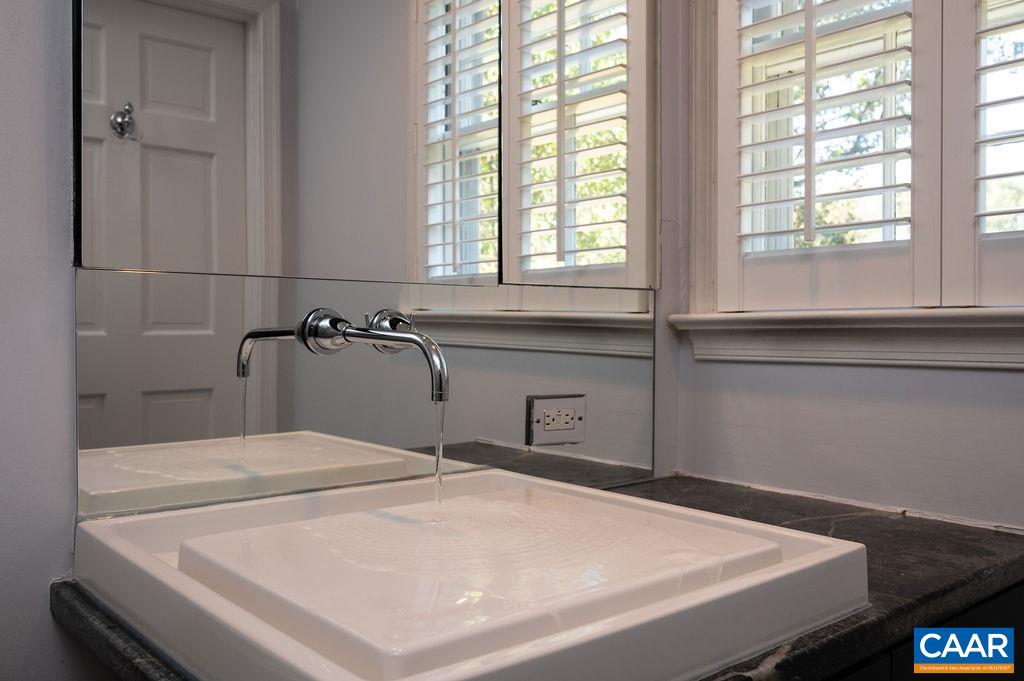 1882 Westview Road Charlottesville, VA 22903 - Photo 30 of 52 a bathroom with a sink and a window