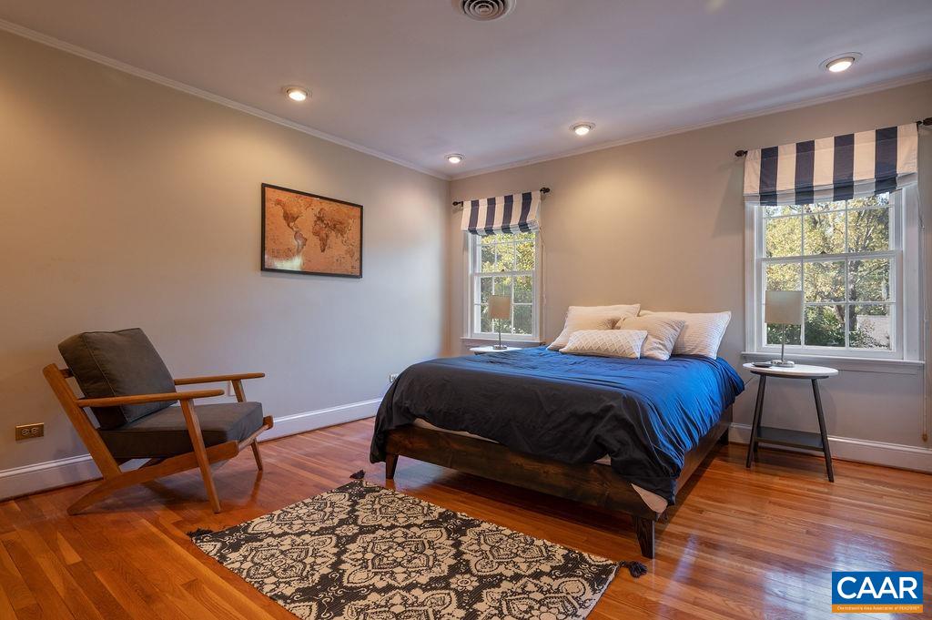1882 Westview Road Charlottesville, VA 22903 - Photo 33 of 52 a bedroom with a bed and chair