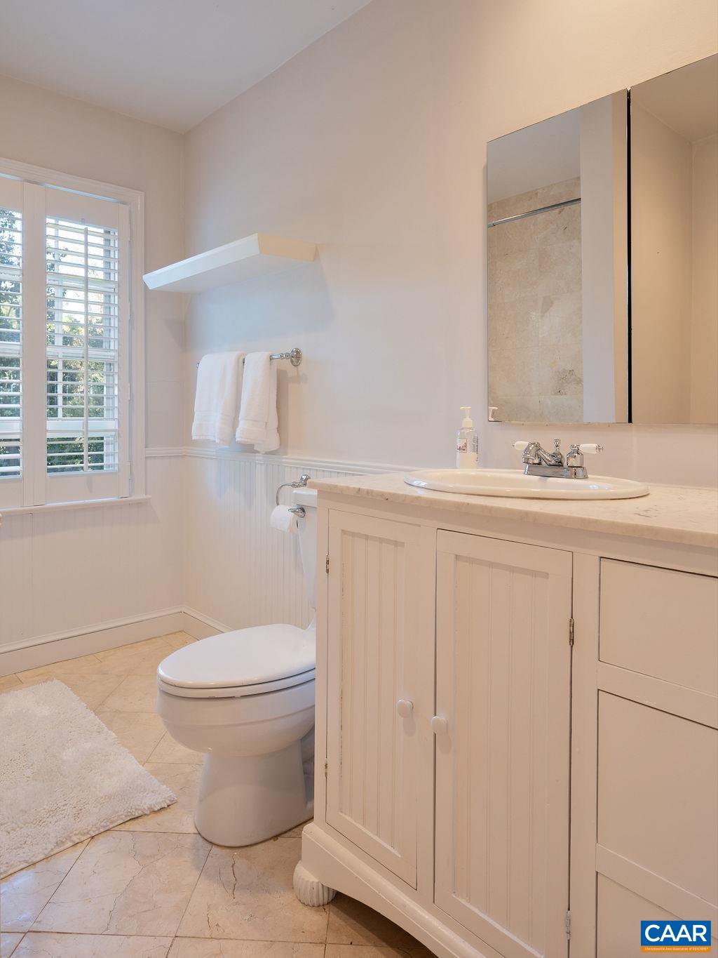 1882 Westview Road Charlottesville, VA 22903 - Photo 35 of 52 a bathroom with a sink toilet and mirror