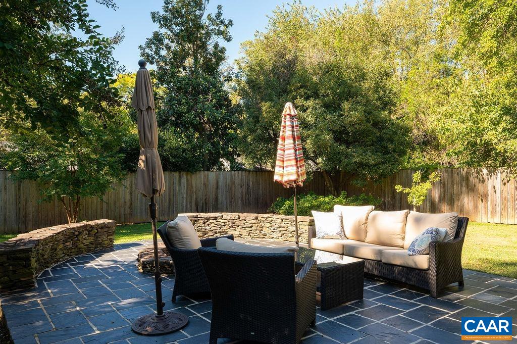 1882 Westview Road Charlottesville, VA 22903 - Photo 41 of 52 a view of outdoor sitting area with furniture and wooden fence