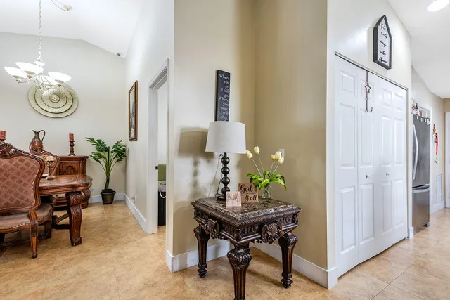 a living room with furniture and a table