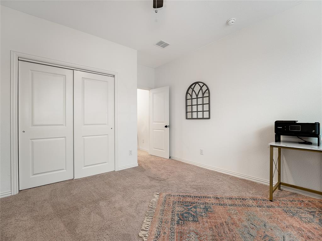 223 Woodson Street Irving, TX 75063 - Photo 28 of 40 a view of an empty room with a window