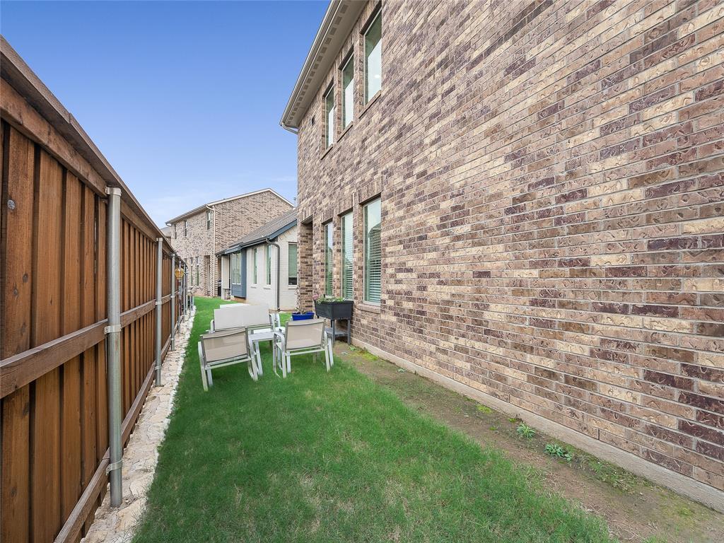 223 Woodson Street Irving, TX 75063 - Photo 35 of 40 a view of outdoor space yard and patio