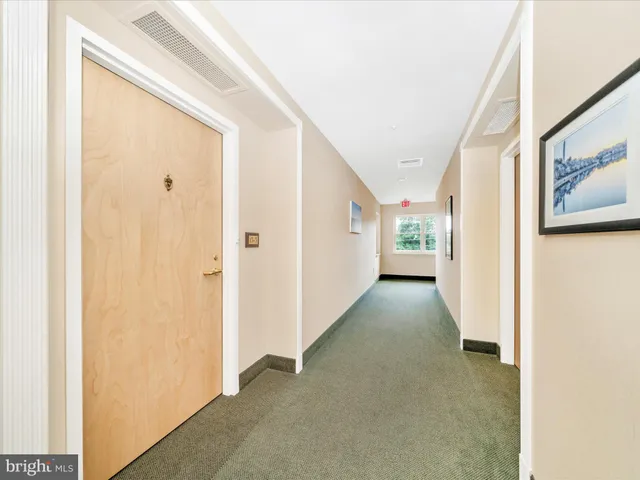 a view of a hallway with window