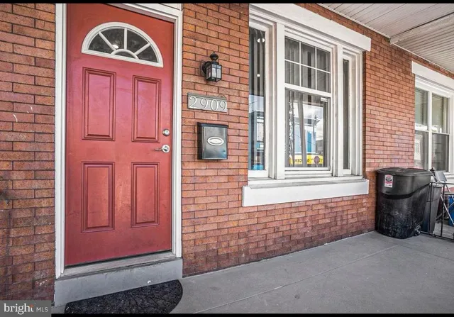 a front view of a house with a door