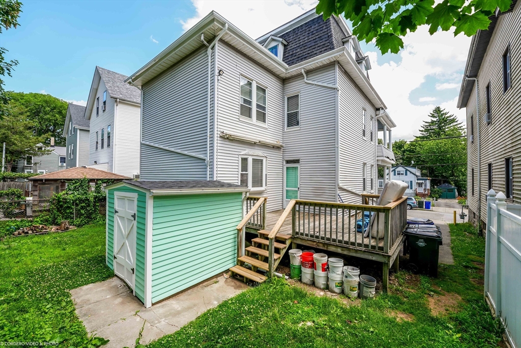 216 Grove Street Fall River, MA 02720 - Photo 5 of 26 a view of front of a house with a yard