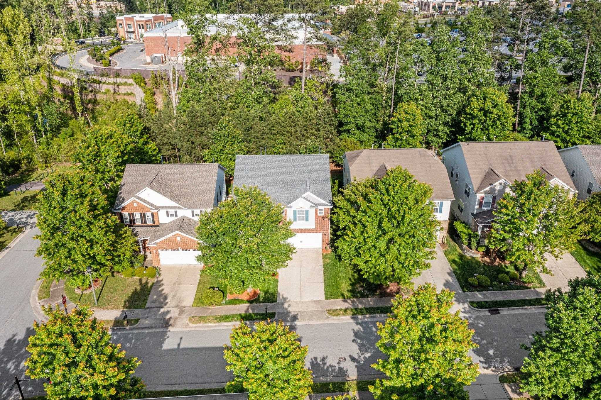 532 Emerald Downs Road Cary, NC 27519 - Photo 11 of 51 an aerial view of a house with a yard and garden