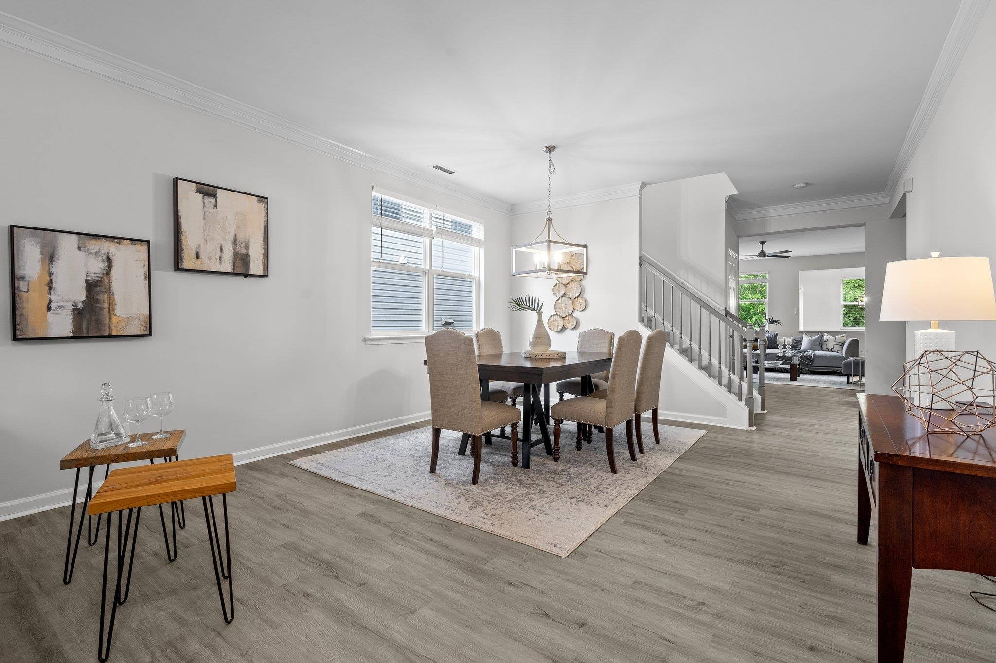 532 Emerald Downs Road Cary, NC 27519 - Photo 14 of 51 a view of a dining room with furniture and wooden floor