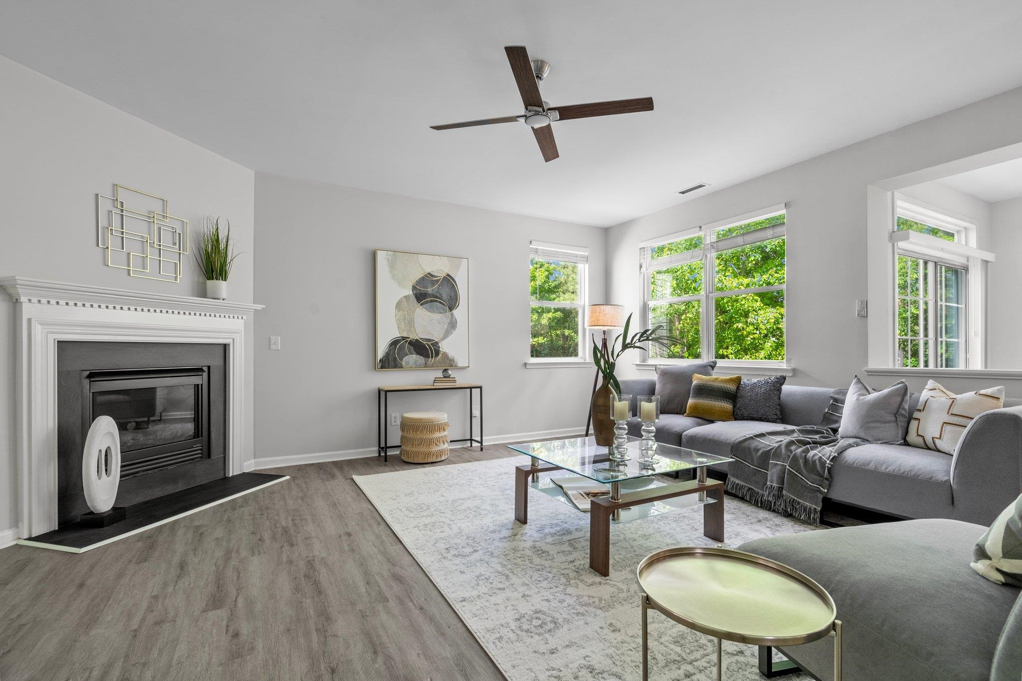 532 Emerald Downs Road Cary, NC 27519 - Photo 20 of 51 a living room with furniture and a fireplace