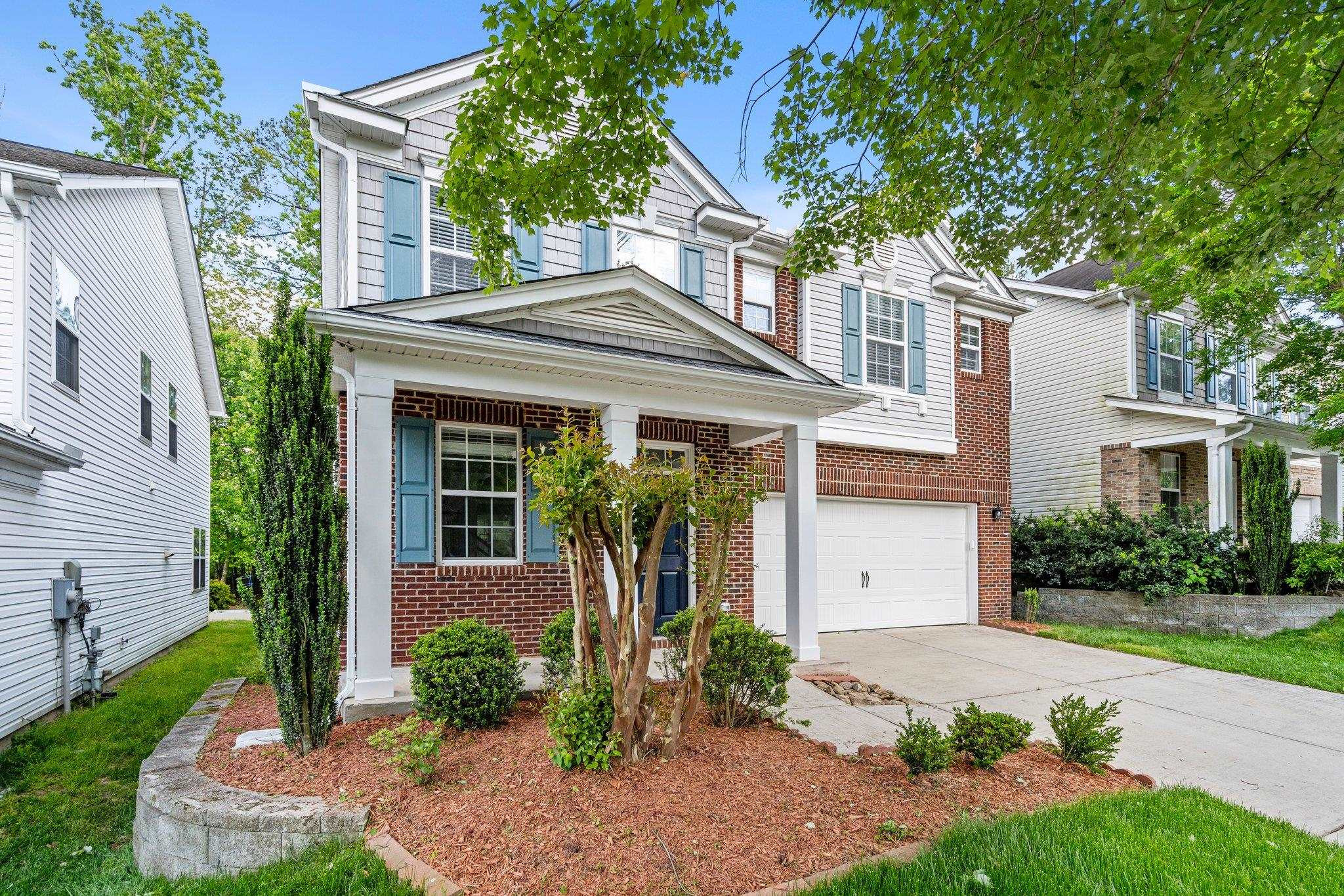 532 Emerald Downs Road Cary, NC 27519 - Photo 3 of 51 front view of a house with a yard