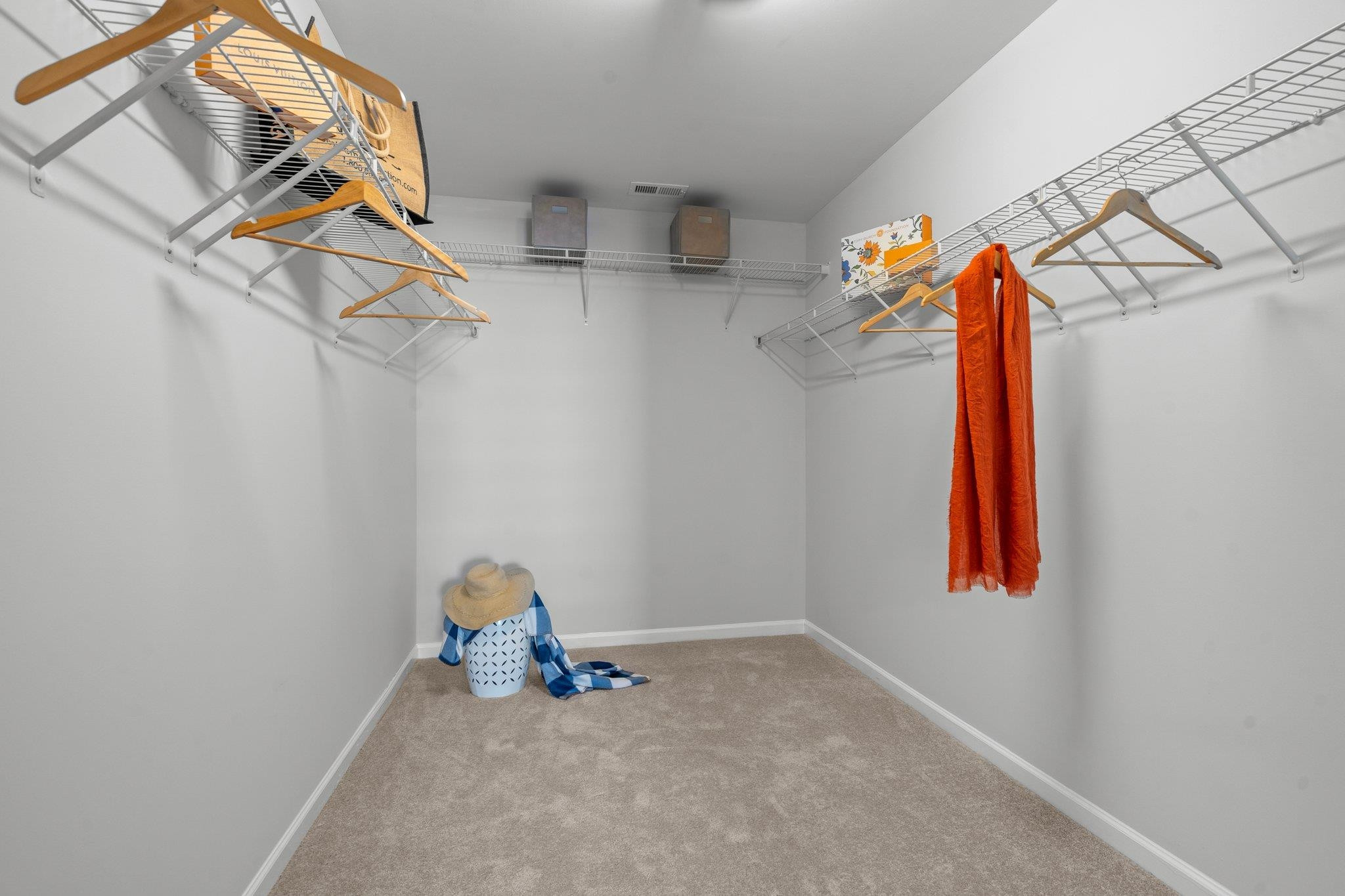 532 Emerald Downs Road Cary, NC 27519 - Photo 35 of 51 a view of a room with racks on the wall