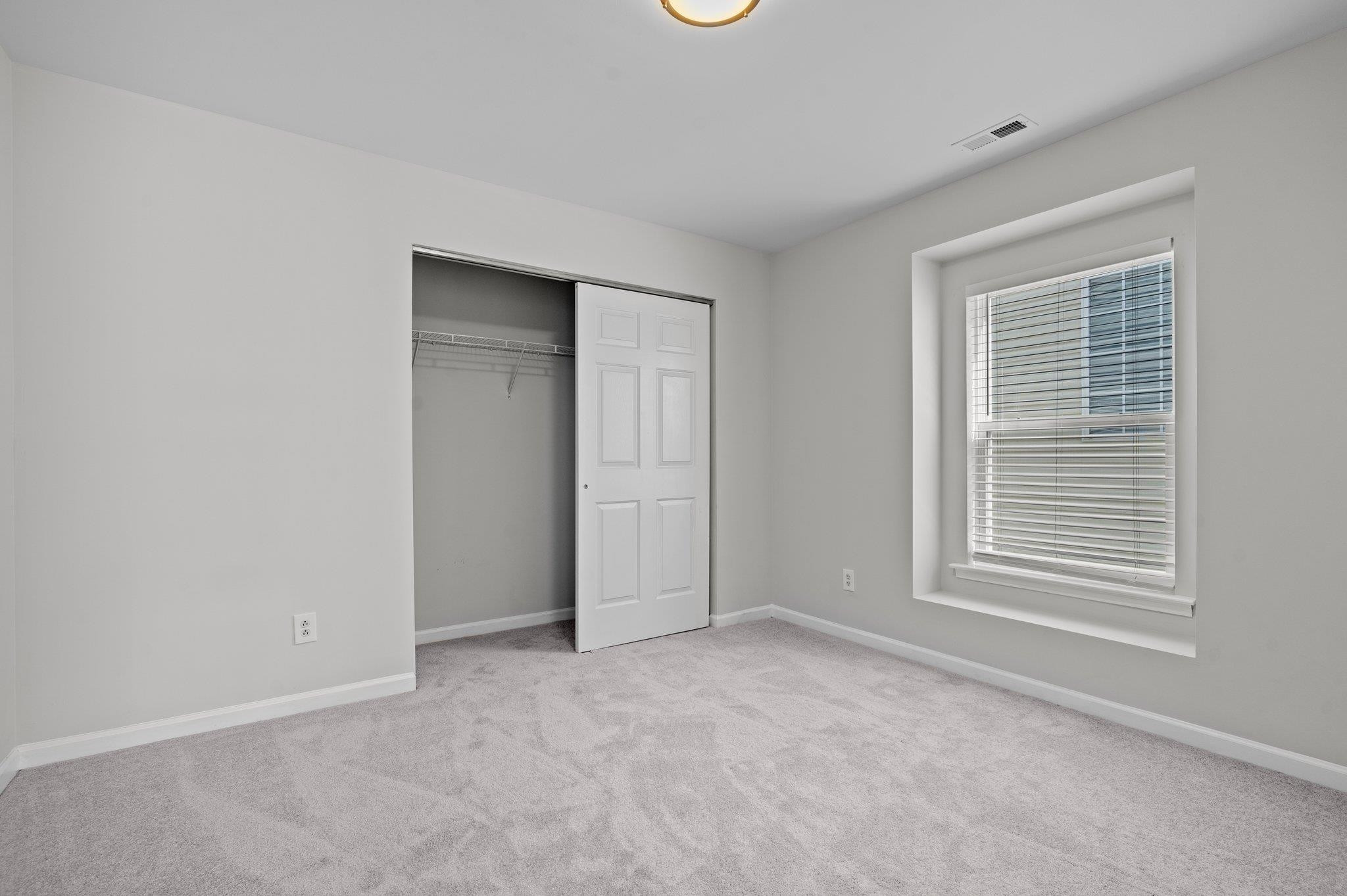 532 Emerald Downs Road Cary, NC 27519 - Photo 42 of 51 a view of an empty room with a window