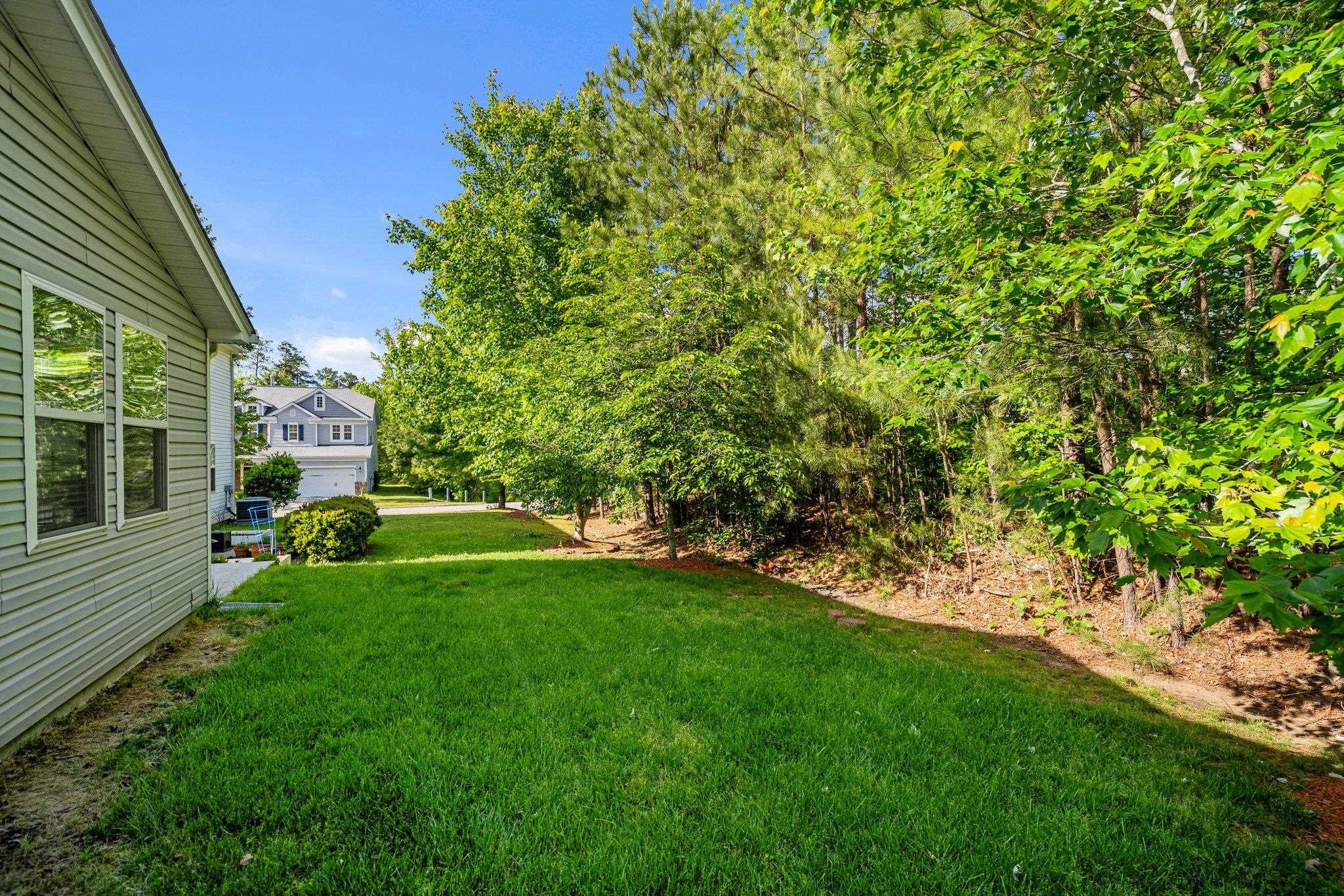 532 Emerald Downs Road Cary, NC 27519 - Photo 7 of 51 a view of yard with swimming pool and green space