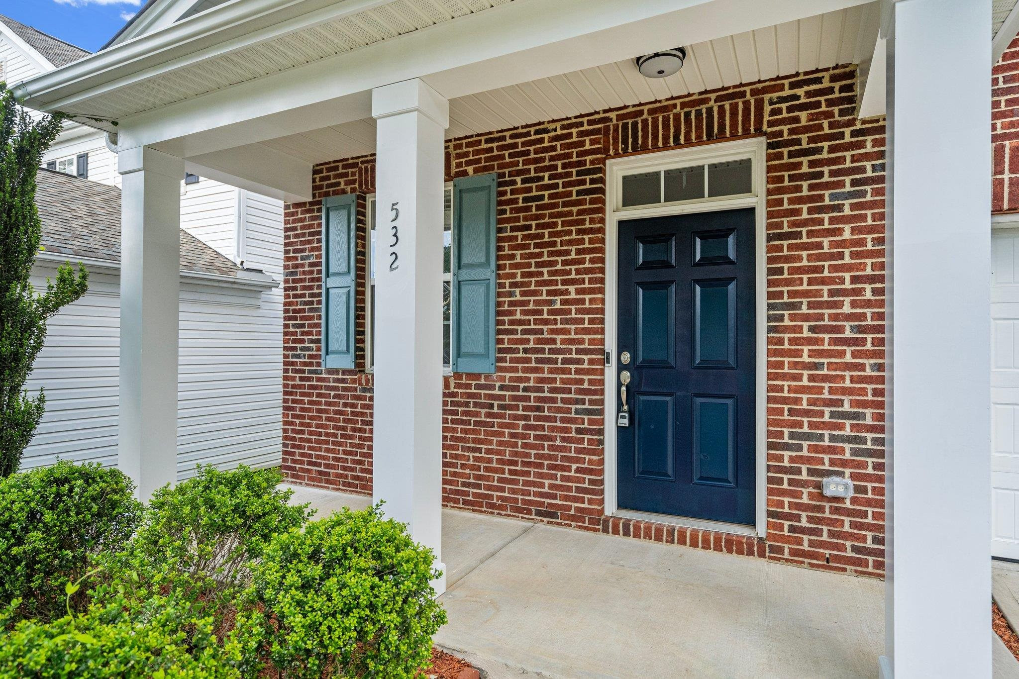 532 Emerald Downs Road Cary, NC 27519 - Photo 8 of 51 a front view of a house with a garage