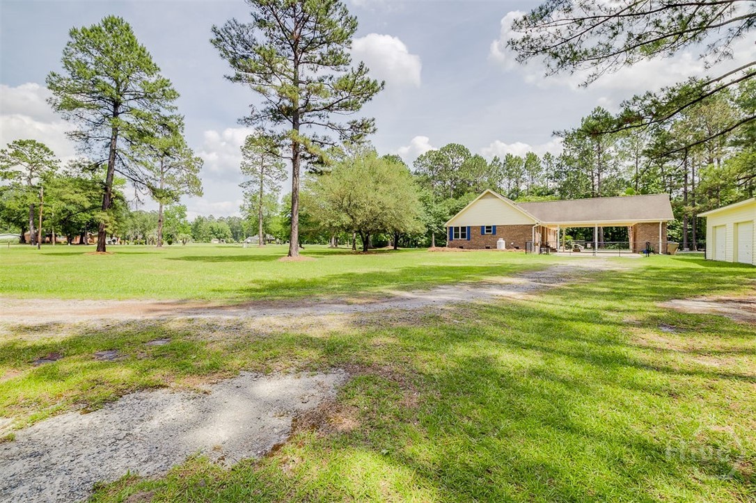 1282 Long Bridge Road Rincon, GA 31326 - Photo 35 of 39 Side view from she shed