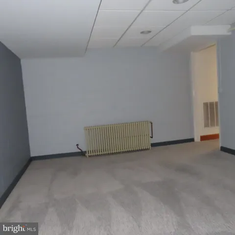 a view of a livingroom with chairs