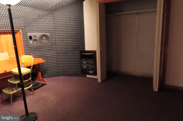 a utility room with cabinets washer and dryer