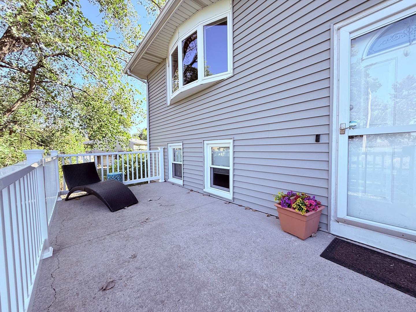8824 Sunset Road Clinton, IL 61727 - Photo 3 of 24 a view of a porch with a furniture