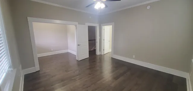 a view of entryway with wooden floor