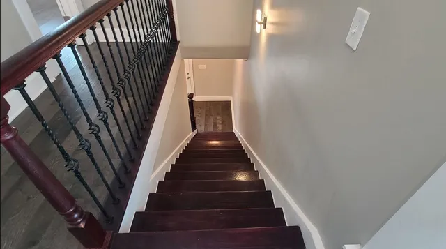 a bathroom with a shower and a toilet