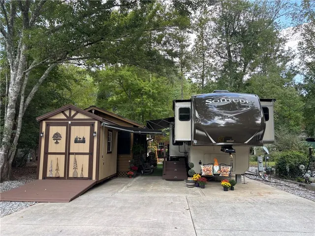 a front view of a house with patio