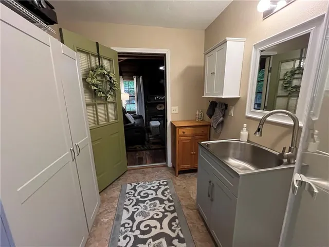 a view of a car park in front of house