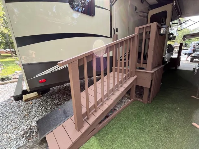 a view of outdoor space with a table and chairs