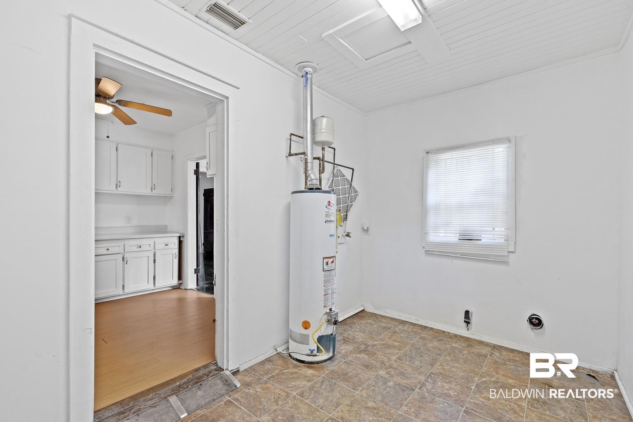 1665 Johnston Street Mobile, AL 36605 - Photo 9 of 17 Utility room featuring gas water heater