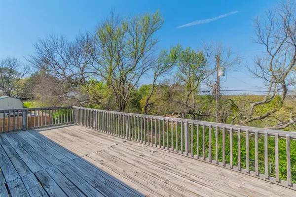 a view of deck and wooden floor