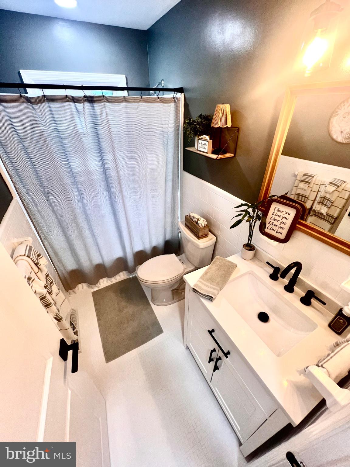 26576 Three Notch Road Mechanicsville, MD 20659 - Photo 16 of 20 Chic bathroom with modern accents.