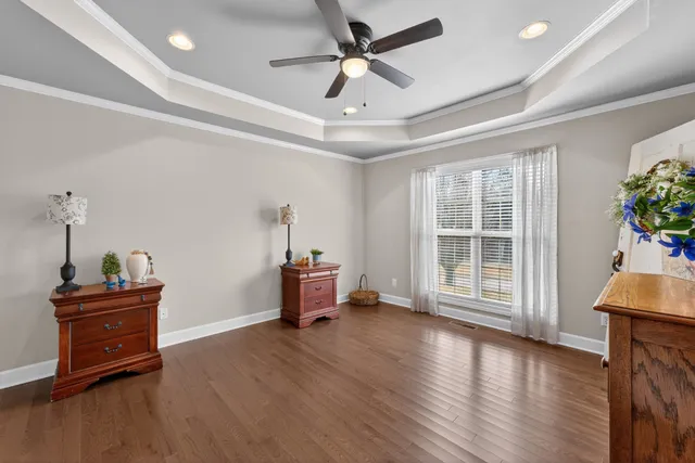 a view of a livingroom with furniture and a chandelier