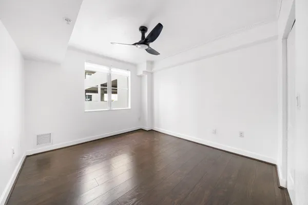 a view of an empty walk in closet
