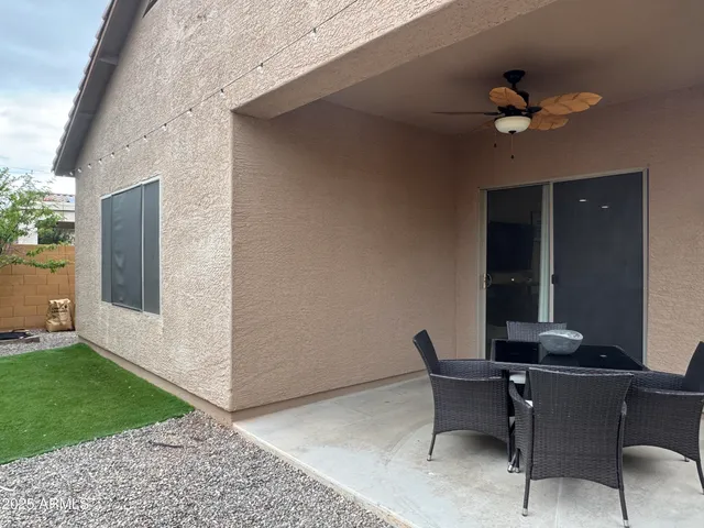 a living room with furniture and a yard