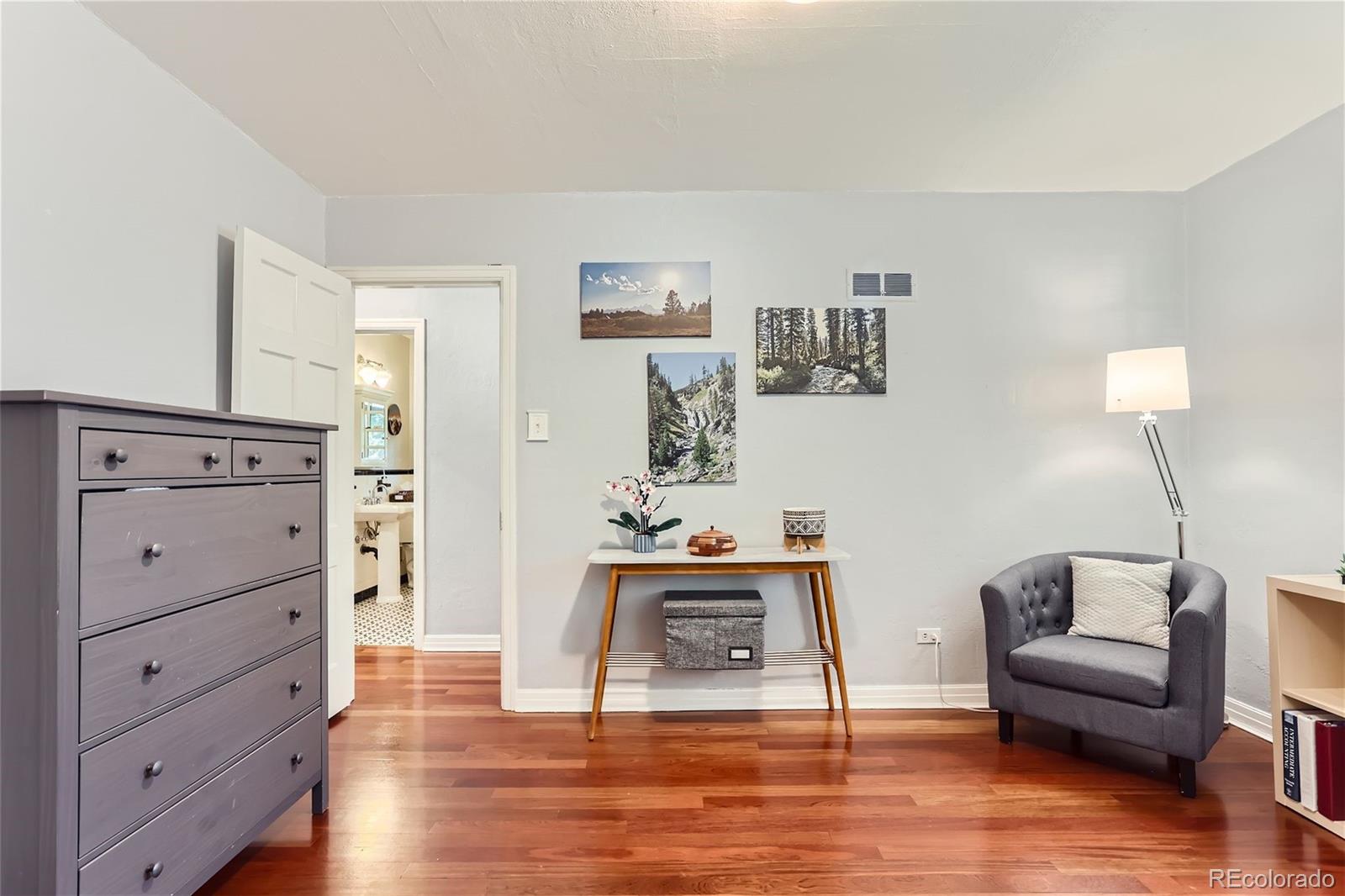 753 Cherry Street Denver, CO 80220 - Photo 16 of 37 a living room with furniture and wooden floor