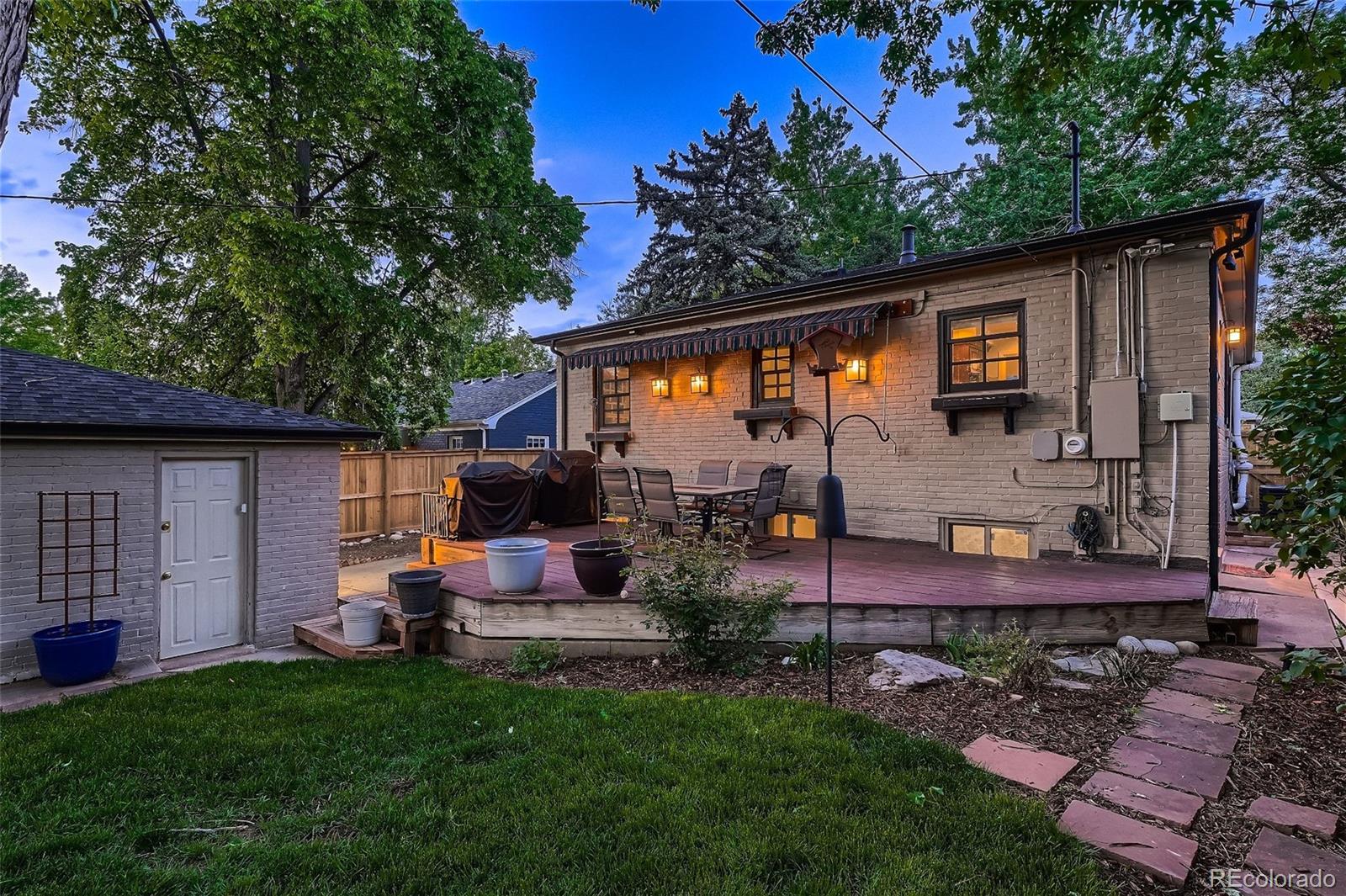 753 Cherry Street Denver, CO 80220 - Photo 32 of 37 a backyard of a house with seating space