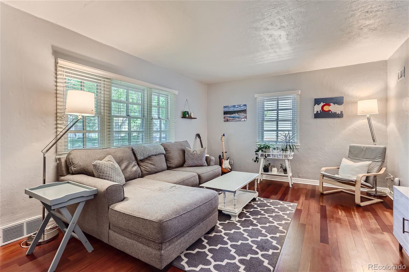 753 Cherry Street Denver, CO 80220 - Photo 7 of 37 a living room with furniture and a wooden floor