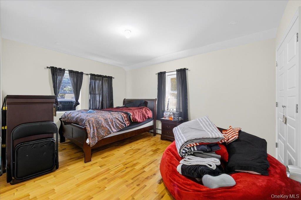 431 Gate Hill Coop Road Stony Point, NY 10980 - Photo 22 of 41 Bedroom with wood finished floors and multiple windows