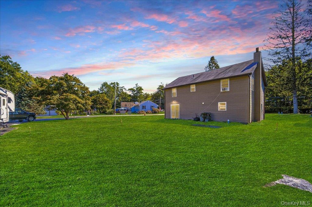 431 Gate Hill Coop Road Stony Point, NY 10980 - Photo 35 of 41 Yard at dusk with a lawn