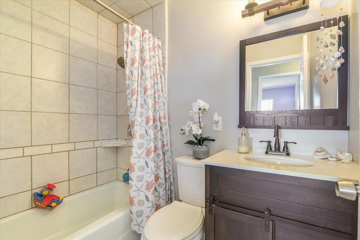 664 Moonglow Road Lompoc, CA 93436 - Photo 17 of 25 a bathroom with a sink a toilet and shower